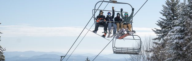 Skiers on Chairlift